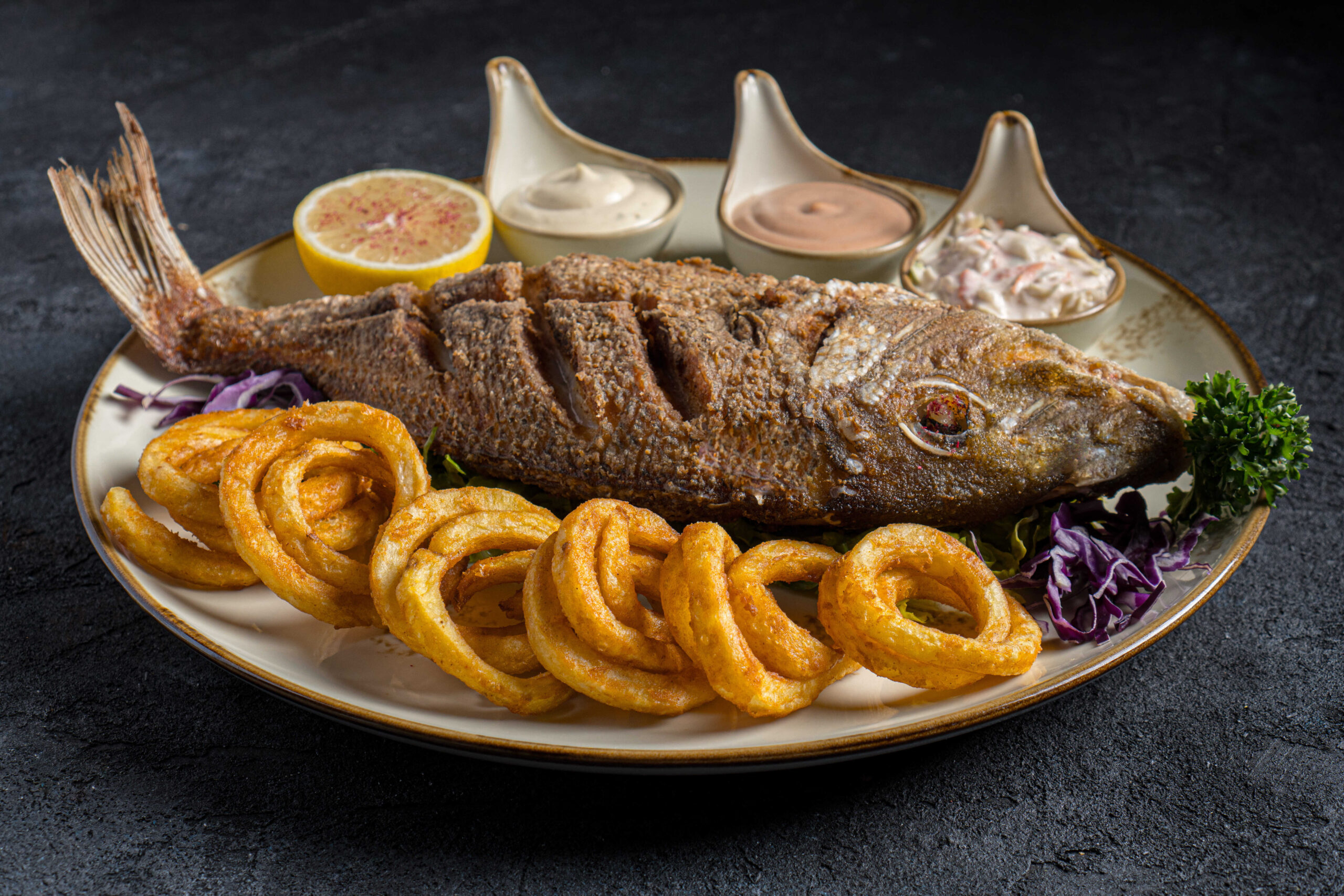 سمكة كاملة مقلية | Whole Fish Fried تقدم مع البطاطا | Served with Potato