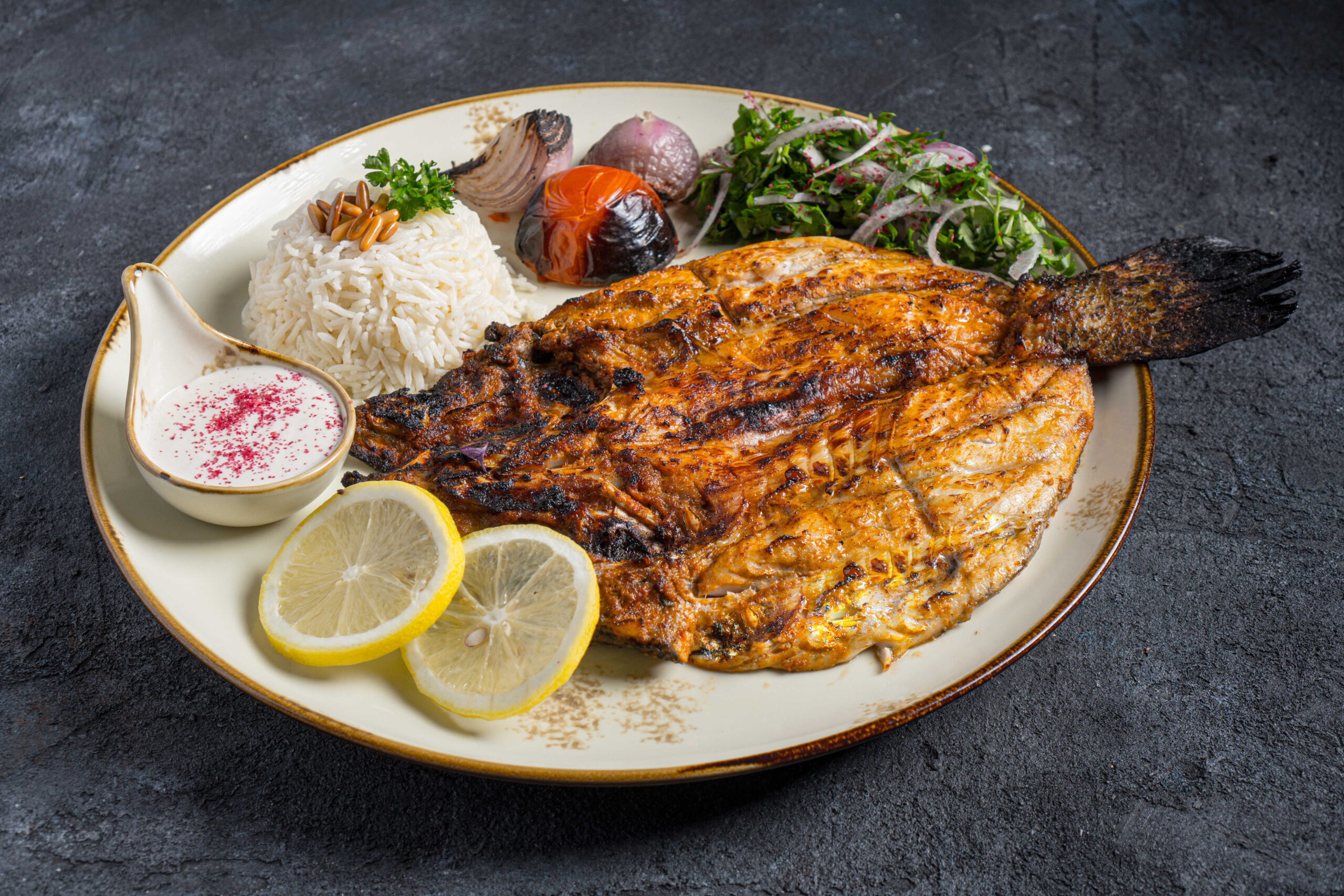 سمكة دنيس مشوية مطفاية بالحامض والثوم |Grilled sea bream with lemon and garlic